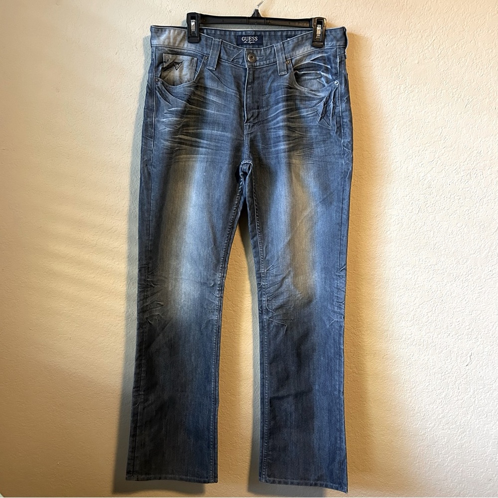Guess women’s waist 33” denim jeans, 4 pockets, Desmond relaxed straight.